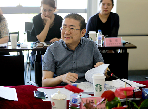 序号4：国家金融与发展实验室副主任杨涛对课题进行评审.jpg